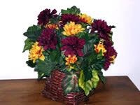 Basket of red and yellow flowers